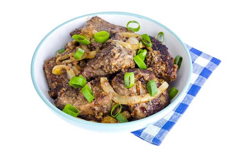 Fried liver with onions in bowl on white background. 5432790 Stock Photo at Vecteezy