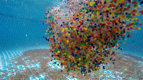 1 Million Orbeez Dropping Into and Out of a Swimming Pool | Swimmer's Daily