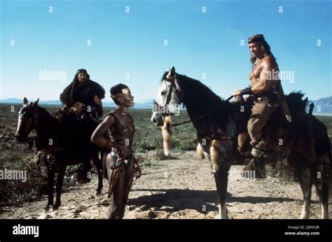 GRACE JONES, ARNOLD SCHWARZENEGGER, CONAN THE DESTROYER, 1984 Stock Photo - Alamy