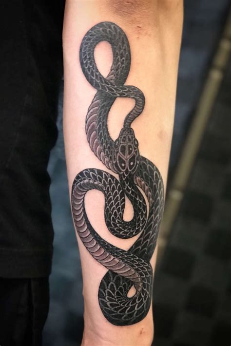 10+ Best Black Mamba Snake Tattoo Designs & Meanings - PetPress