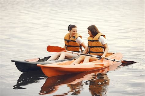 Free Photo | Kayaking. a women in a kayak. girls paddling in the water.