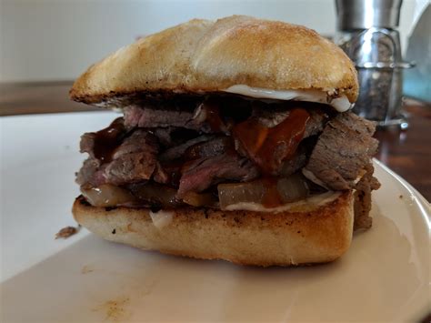 [Homemade] Rib-Eye Steak Sandwich with Caramelized Onions on a grilled ...