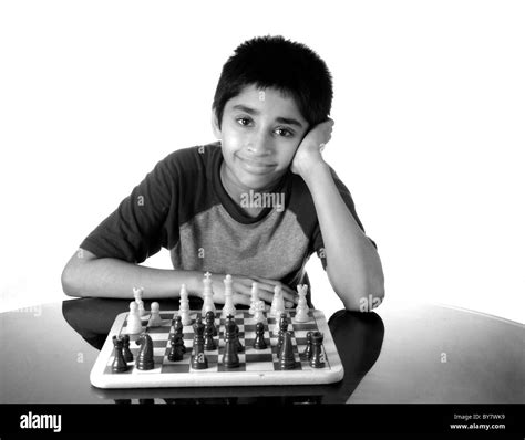 Asian child playing chess Black and White Stock Photos & Images - Alamy