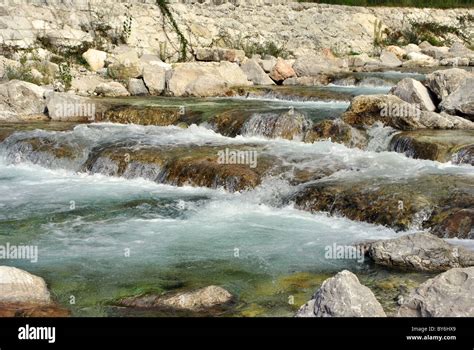 clear mountain river with a waterfall Stock Photo - Alamy