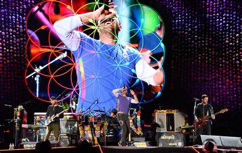 Watch 19-year-old fan join Coldplay on stage to play 'Everglow'