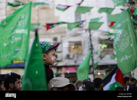 A kid with a Hamas headband during a rally marking the 32nd anniversary ...