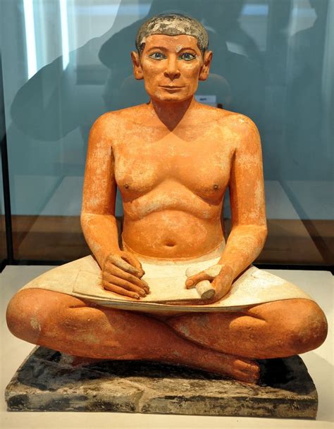 The Scribe is an ancient Egyptian painted limestone sculpture of a seated scribe at work from ...