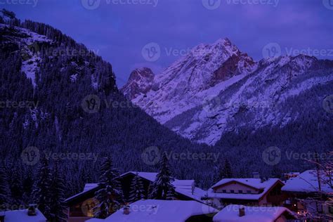 mountain village in alps at night 10643145 Stock Photo at Vecteezy