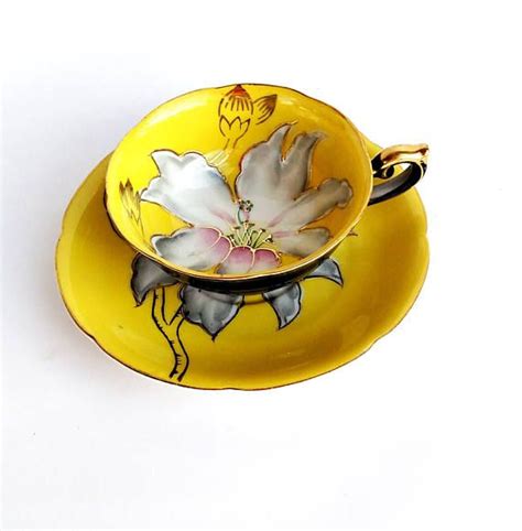 This gorgeous vintage teacup and saucer set was made in the 1960s by Halsey Fifth Ave in Japan ...