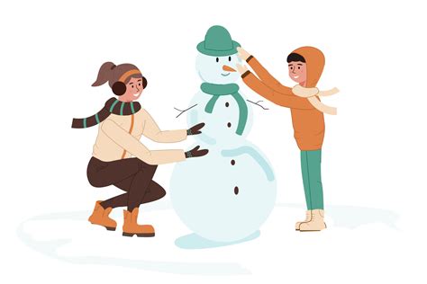 Children make a snowman out of snow. A girl and a boy play outdoors ...