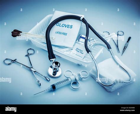 Medical instruments for ENT doctor on pale blue Stock Photo - Alamy