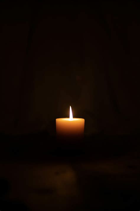 lighted candle in dark room photo – Free Candle Image on Unsplash