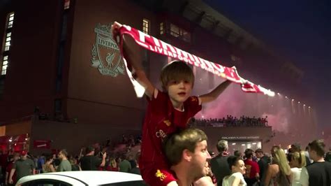 Liverpool fans celebrate first league title in 30 years outside Anfield ...