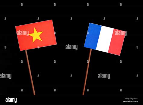 Vietnamese flag with French flag isolated on black background Stock ...