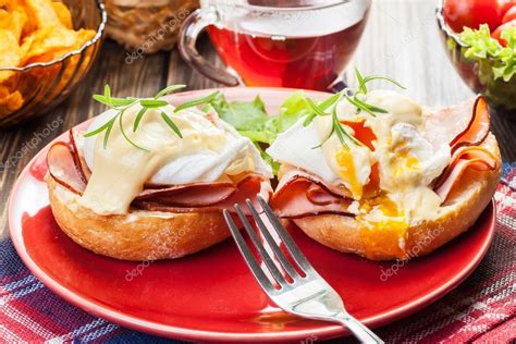 Eggs Benedict on toasted muffins with ham Stock Photo by ©fotek 49494151