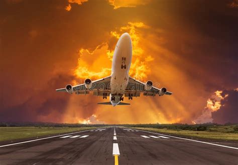 Airplane Flying Take Off from Runway on Sunset Stock Photo - Image of sunset, asphalt: 79108666