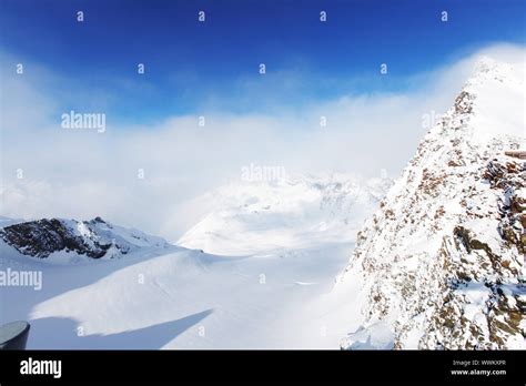 top of alps in sky Stock Photo - Alamy