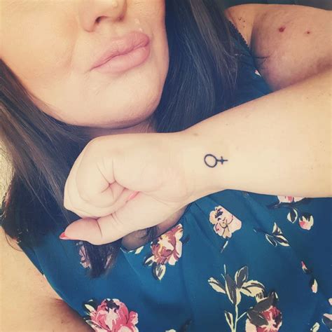 Female symbol tattoo | Tattoos, Tattoo designs, Thigh tattoo