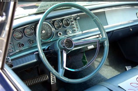 1964 Chrysler Newport interior. Notice the push button gear shift to the right of the steering ...