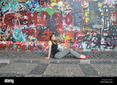 Colorful graffiti at the famous John Lennon wall in Prague, Czech Republic. Model Release ...