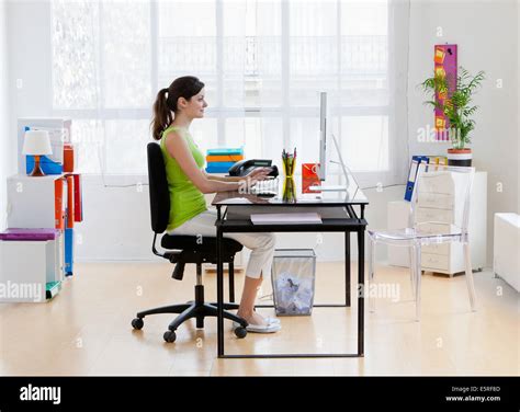 Right posture for working at a computer Stock Photo - Alamy