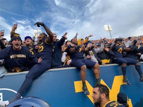 The Past, Present and Future of WVU Football Joins in on the Horns Down Fun - WV Sports Now