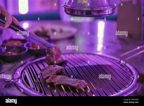 Sizzling Korean BBQ closeup in the restaurant Stock Photo - Alamy