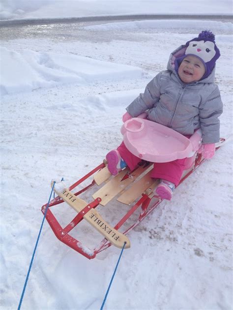 How to make a baby sled? Attach your travel high chair/booster seat to the sled and go!