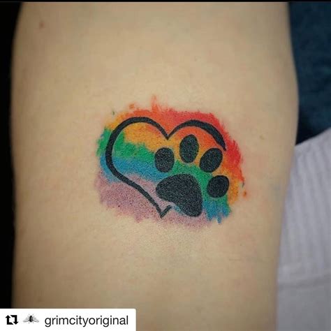 Rainbow paw tattoo | Pawprint tattoo, Rainbow tattoos, Paw tattoo