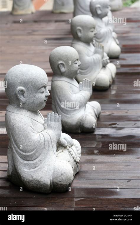 Kong Meng San Phor Kark See Monastery. Stone Buddhist monks. Singapore ...