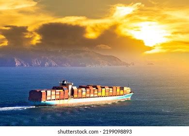 Container Cargo Ship Against Sunset Sky Stock Photo 2260751903 | Shutterstock