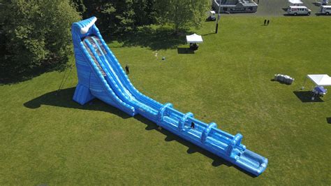 100-ft Long Blue Crush Water Slide Rental · National Event Pros