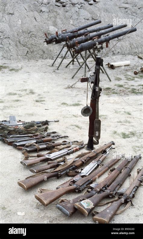 Militia captured weapons and ammunition of US Italian and Pakistani make Stock Photo - Alamy