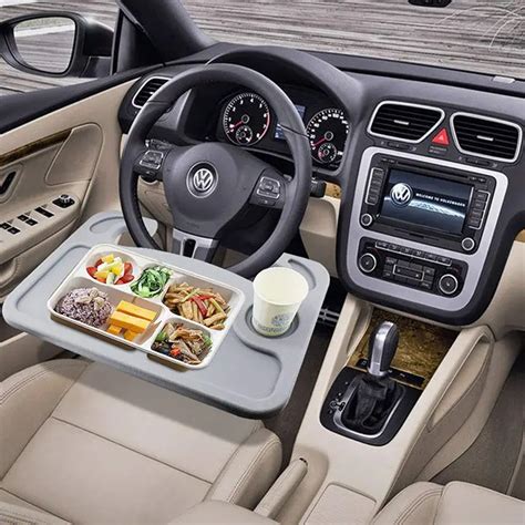 Smart Steering Wheel Tray Lets You Eat in the Comfort of Your Car