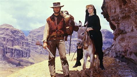 AMC wants viewers to spend Christmas with superstars John Wayne and Clint Eastwood