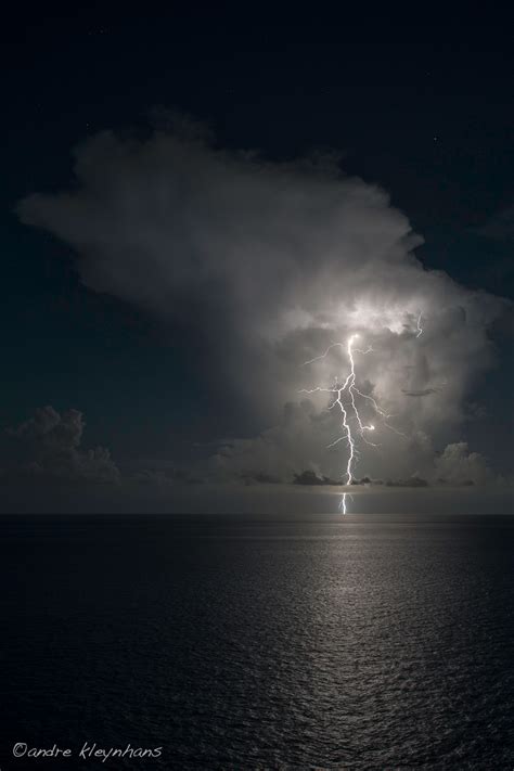 Into The Night Photography: Ocean Lightning by Andre Kleynhans