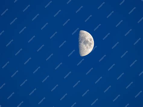 Premium Photo | The growing moon in the first quarter with craters