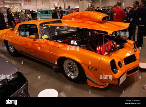 Custom vintage classic American retro cars on display at a car local indoor car show Stock Photo ...