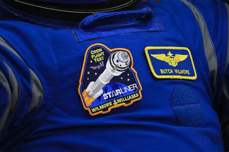 NASA astronauts debut new patch design for Boeing Starliner crew flight ...