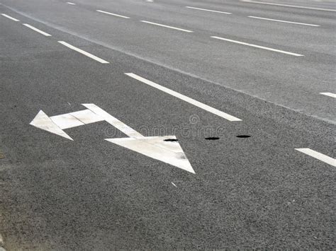 Road markings arrow stock image. Image of adventure, arrow - 15530431