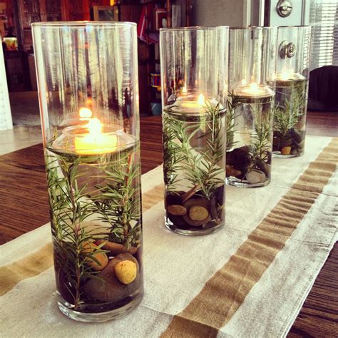 Festive Centerpiece - River rocks, Rosemary & Floating Tealights | Festive centerpieces, Dollar ...