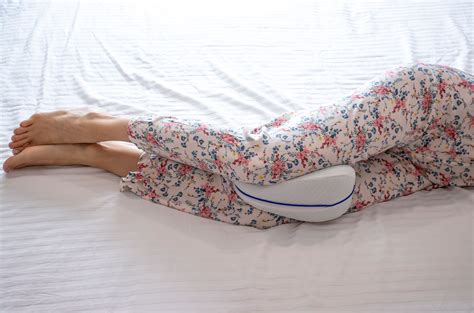 Sleeping With a Pillow Between Your Knees | Sleep Foundation