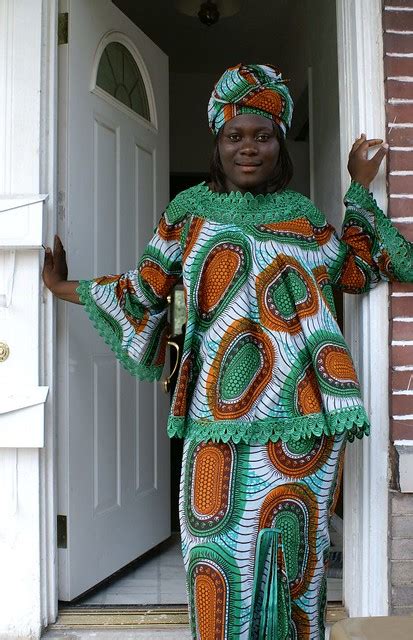 Sierra Leone | A neighbor in traditional dress. Her pose was… | Flickr