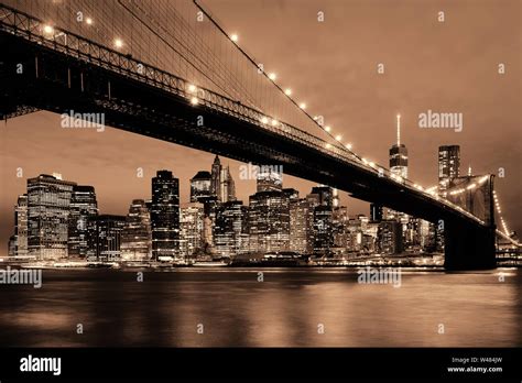 Manhattan Downtown urban view with Brooklyn bridge at night Stock Photo ...