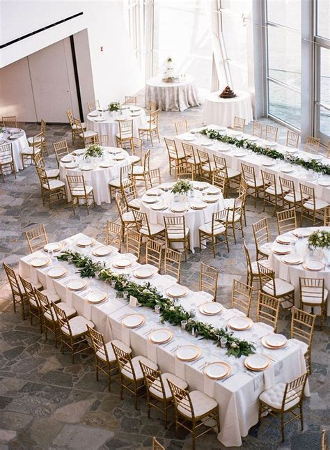 Mixed round and rectangle gold and white wedding reception table layout