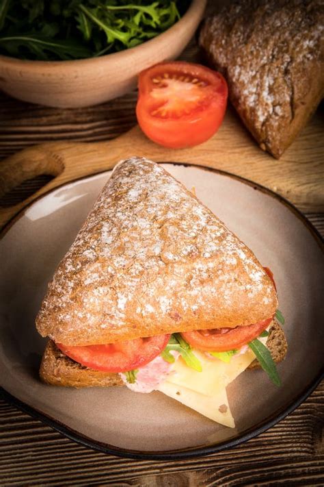 Triangular Sandwich with Cheese, Ham and Tomato. Stock Image - Image of italian, roll: 123063695