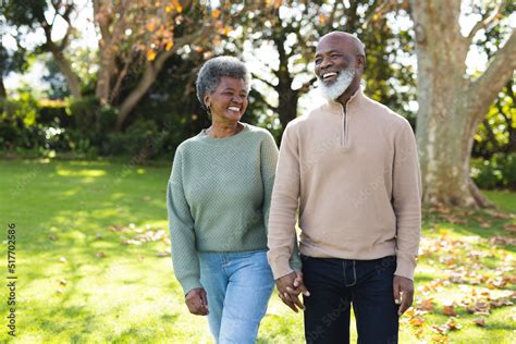 Image of happy african american senior couple in garden Stock Photo ...