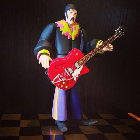 John would like to sing you a song. The Beatles "Yellow Submarine" toy ...