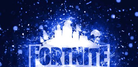 Download Fortnite Logo With Snow Falling On It Wallpaper | Wallpapers.com