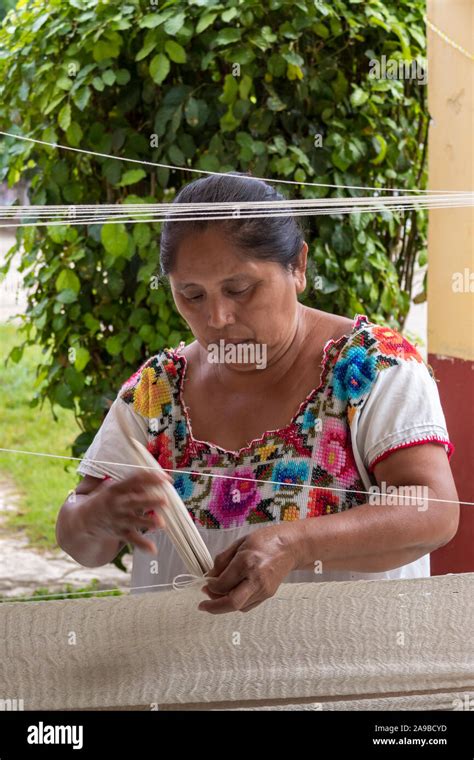 YUCATAN, MEXICO. OCT 22 2017. Mayan woman working on hammock. Weaving ...